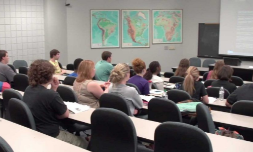 A lecture hall with students taking an ESL course that is offered as part of BCC's multicultural programs.