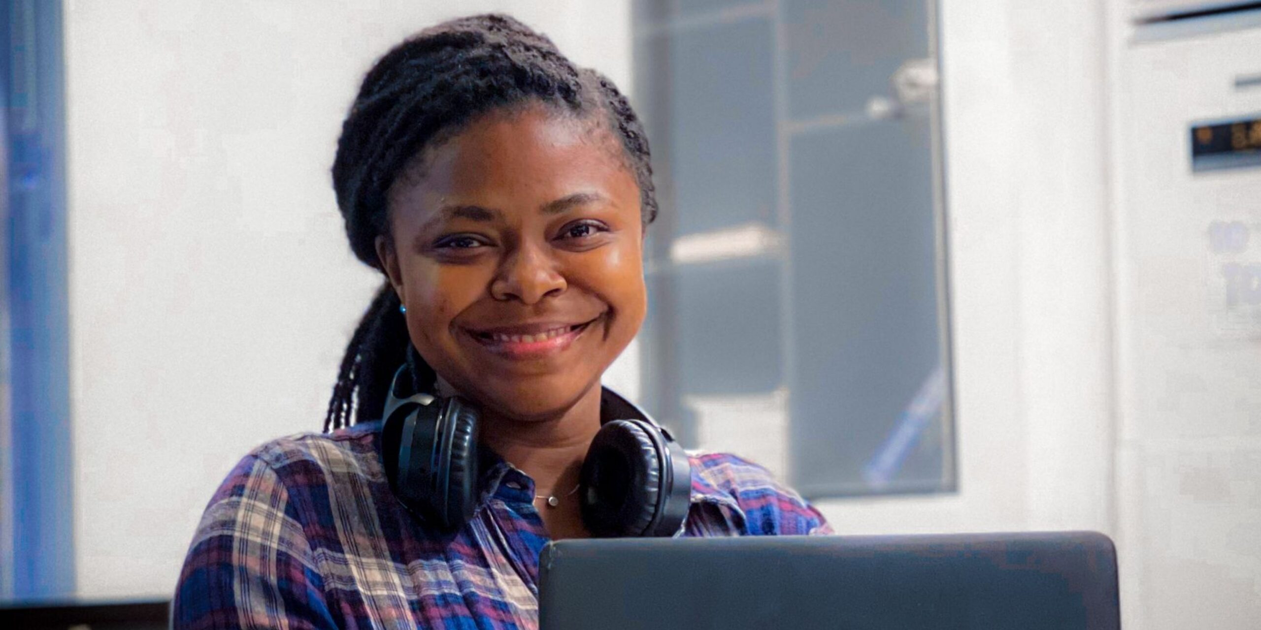 smiling female student working online