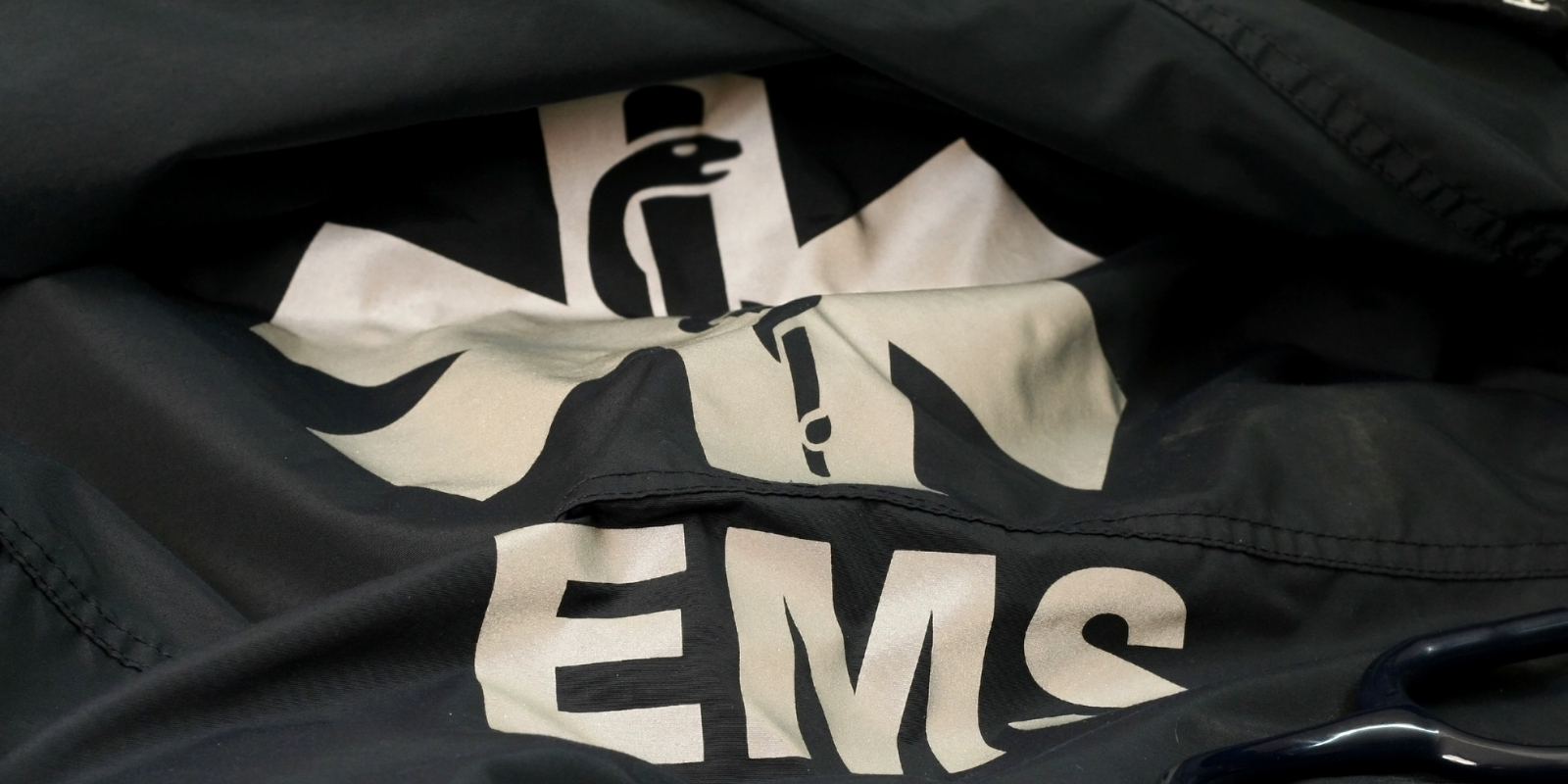 the back of an ems worker's jacket